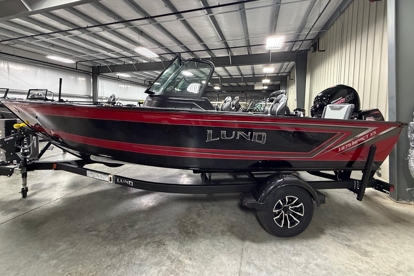 Lund 1875 Impact XS Fish & Ski Boat with Mercury 150 XL Pro XS and ShoreLand'r Trailer